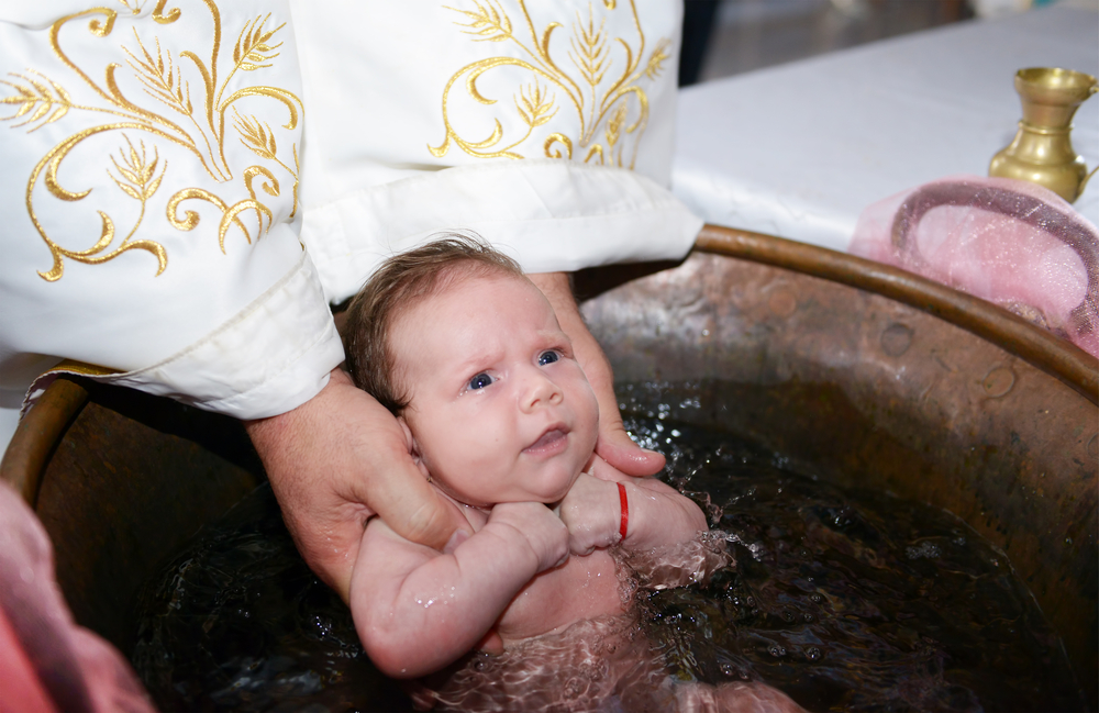 Baby being baptized