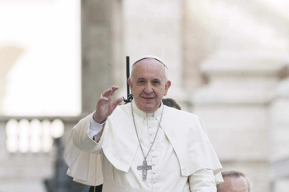 Pope Francis waves at general weekly audience