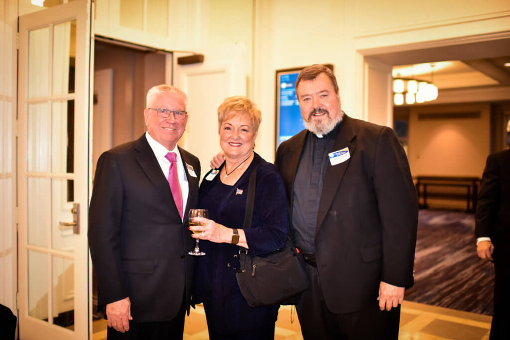 Frank and Shirley Schilling with Father Simon