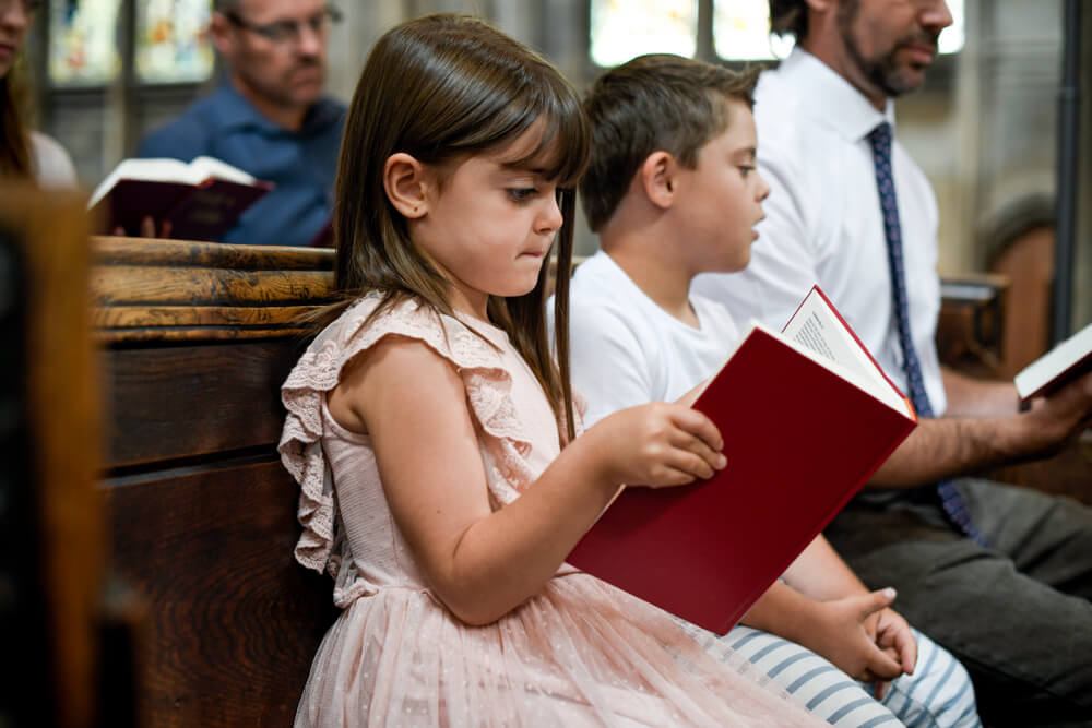 kids sing at Mass
