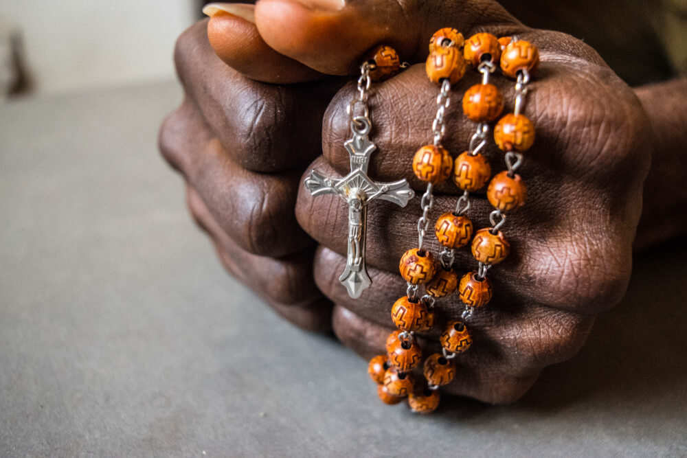 hands holding Rosary