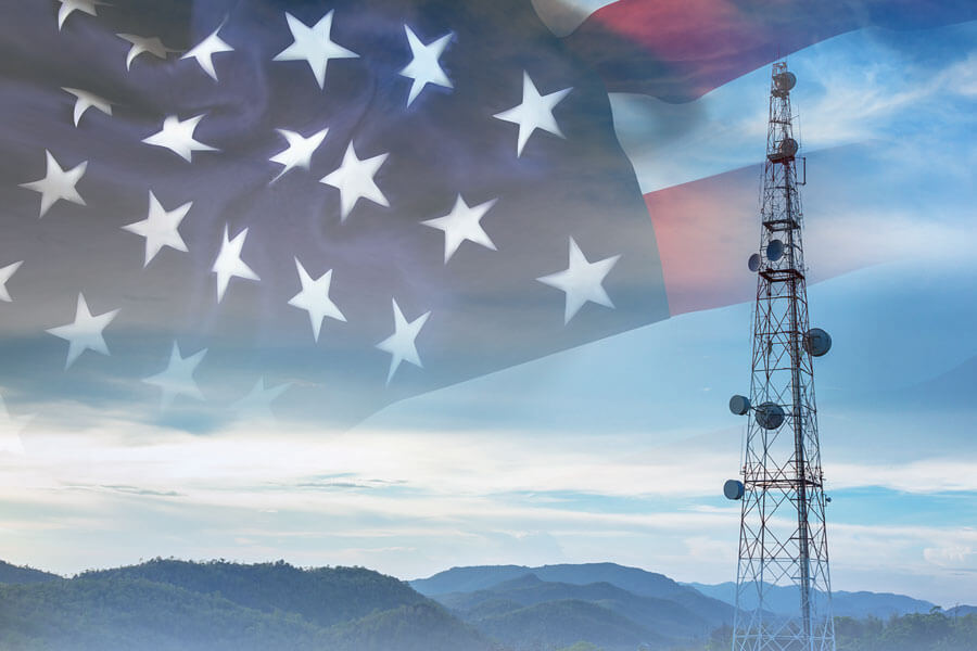 American flag with radio tower