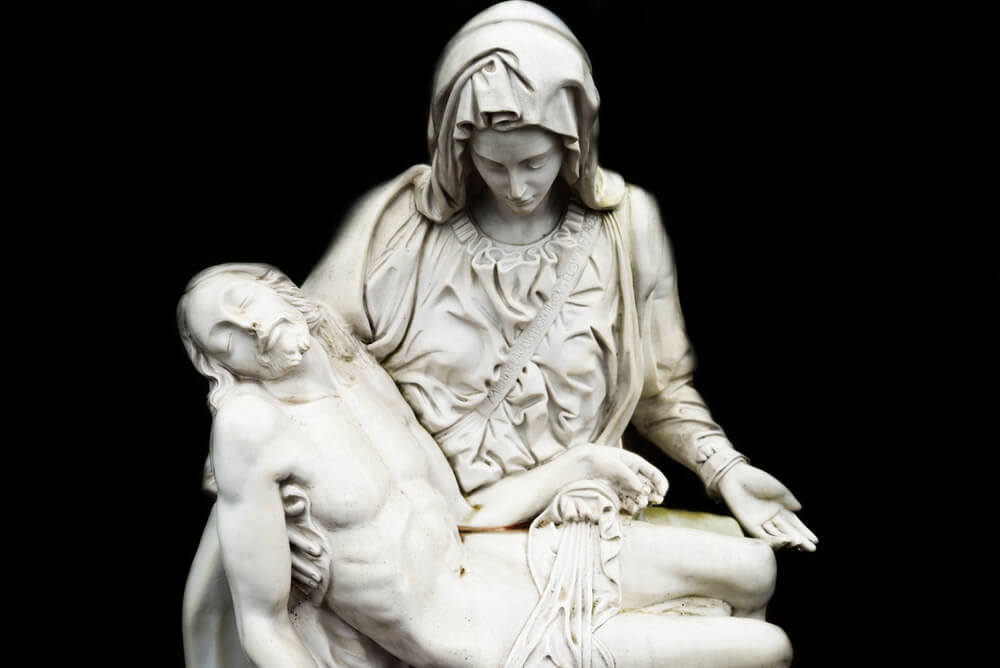 Blessed Mother holds body of Jesus