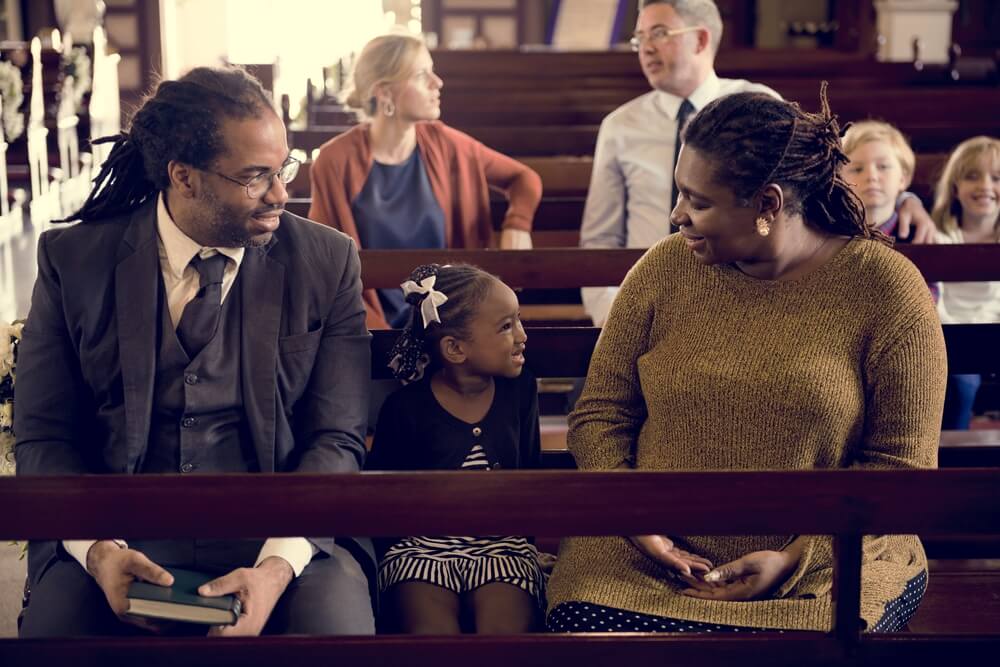 family in church pew