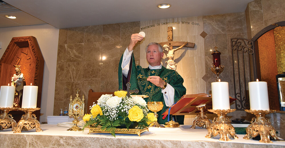 Father Rocky celebrating daily Mass