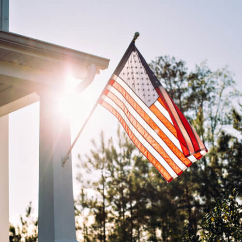 American flag flying on front porch