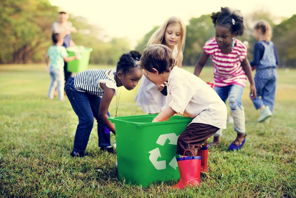 Kids work to recycle and care for environment
