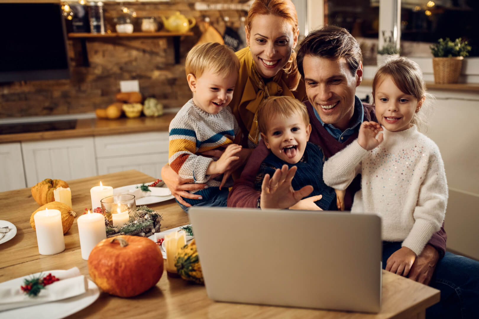 Family being present to others at Thanksgiving by video call