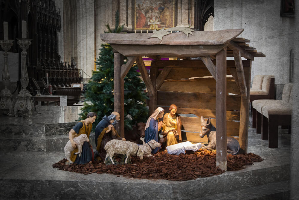 Nativity scene with empty manger for advent
