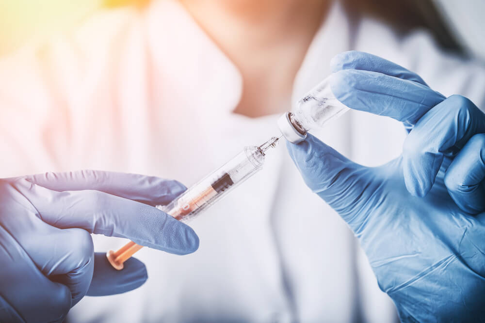 doctor prepared a Covid-19 vaccine syringe