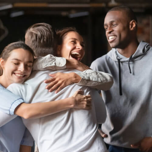friends celebrate good news